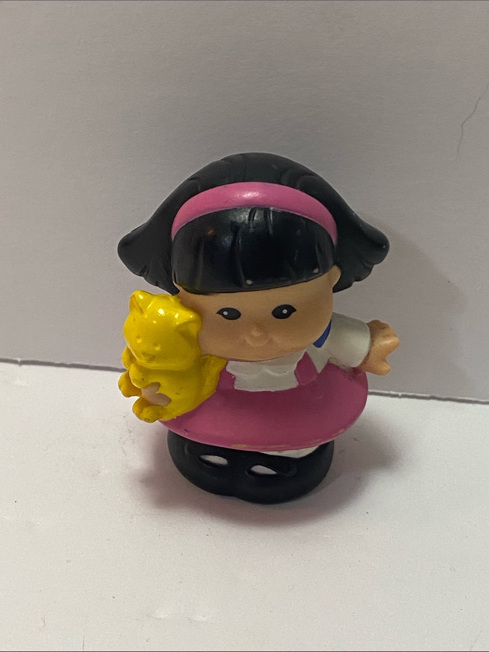 Little people character pink dress , yellow cat